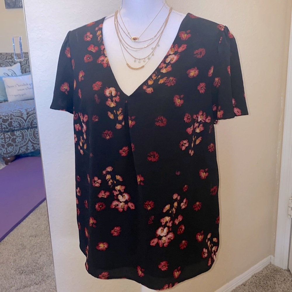 Flowy black top with red flowers